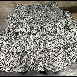 From a boutique. Size small but Stretchy could fit a medium. Never worn